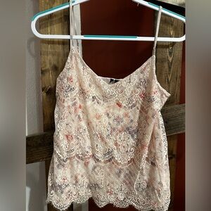 Lace covered tank top. Blue and pink flower detail beneath. Size small